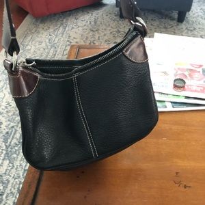 Black and brown Dooney and Bourke pocket book . All leather very good condition